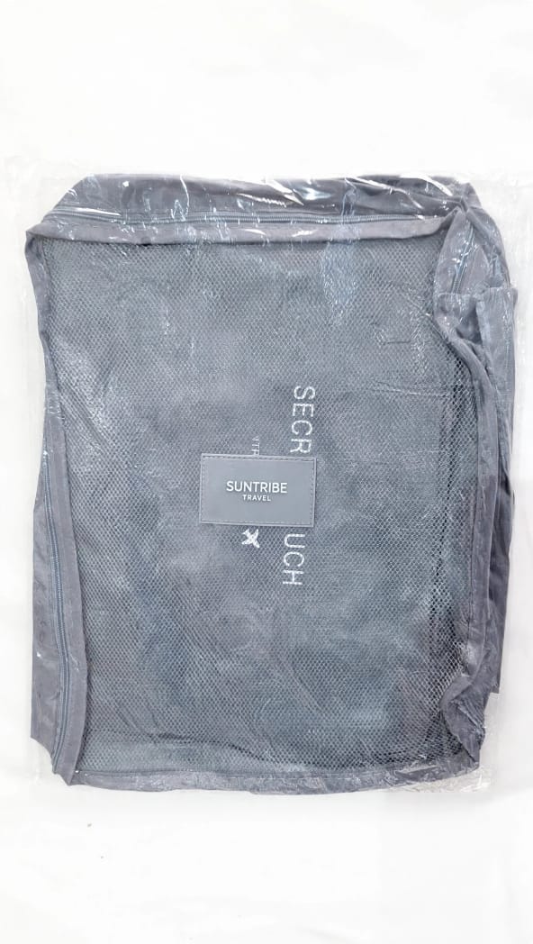 Grey Suntribe Secret Pouch travel organiser and mesh laundry bag in packaging
