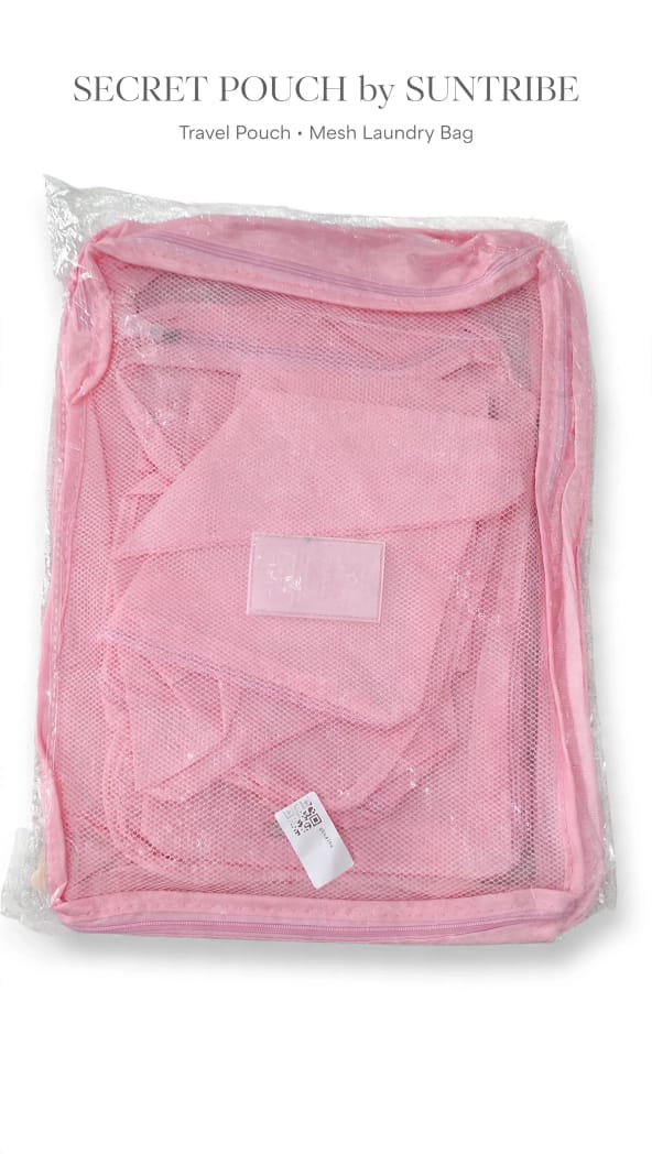 Pink Suntribe Secret Pouch travel organiser and mesh laundry bag in packaging