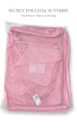 Pink Suntribe Secret Pouch travel organiser and mesh laundry bag in packaging