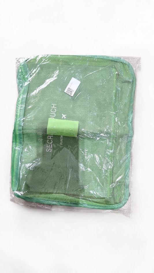 Green Suntribe Secret Pouch travel organiser and mesh laundry bag in packaging