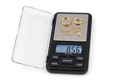 MH-Series Digital Pocket Scale open with jewelry on platform